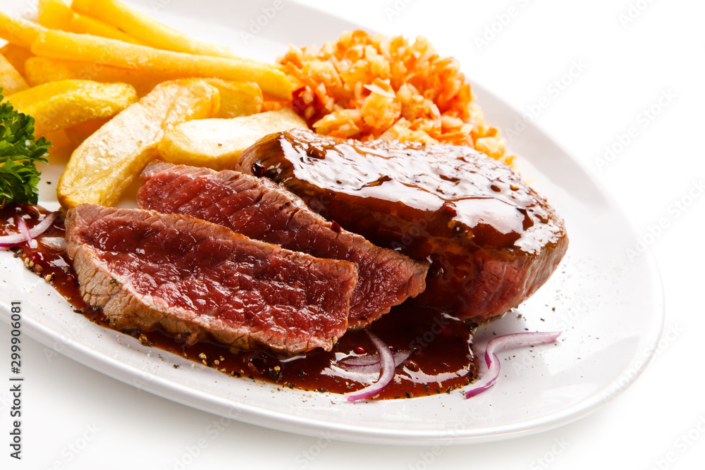 Grilled steak with french fries on white background Grilled steak with french fries on white background