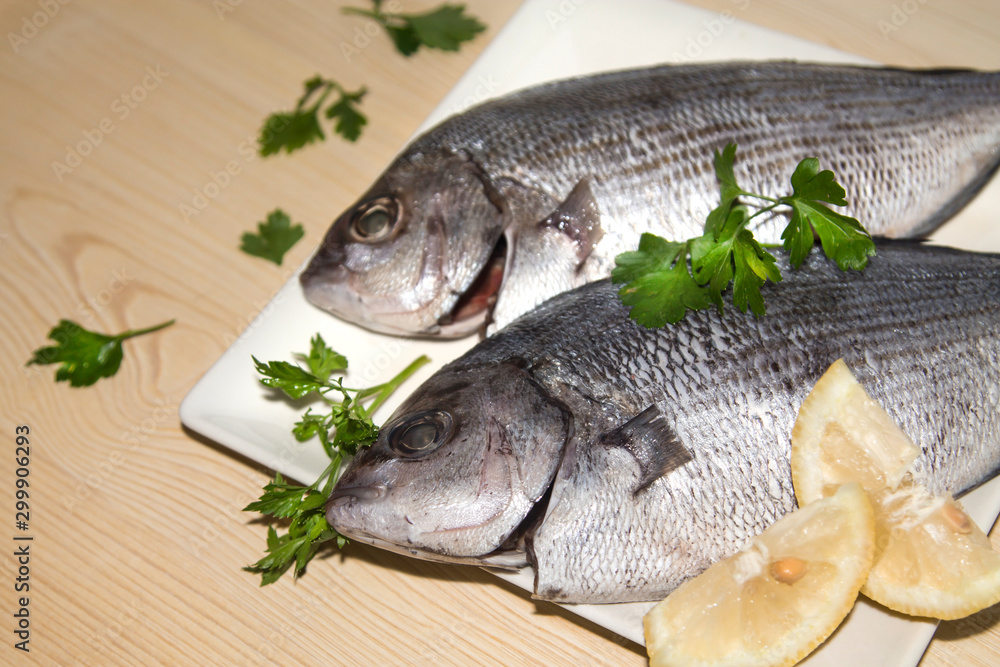 fresh fish with lemon and parsley fresh fish with lemon and parsley