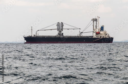 Logistics and transportation of International Container Cargo ship in the ocean at Sunshine sky, Freight Transportation, Shipping