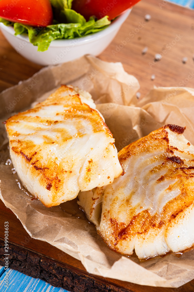Fish dish - fried fish fillet with vegetables Fish dish - fried fish fillet with vegetables