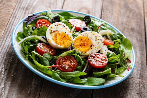 Salad with boiled egg and vegetables