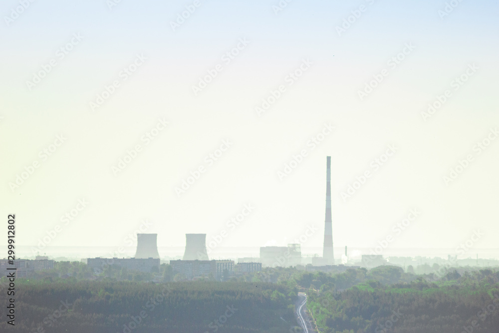 Urban landscape, view of pipes of plants and factories Urban landscape, view of pipes of plants and factories