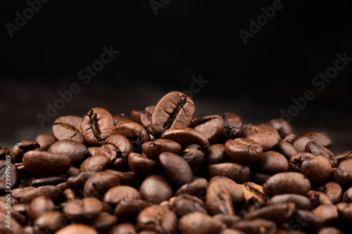 Coffee beans macro on black background