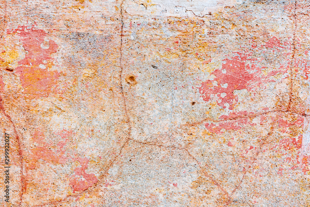 Texture of a concrete wall with cracks and scratches which can be used as a background Texture of a concrete wall with cracks and scratches which can be used as a background