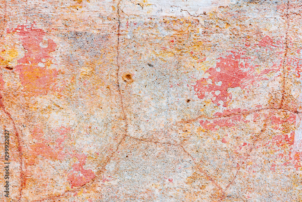 Texture of a concrete wall with cracks and scratches which can be used as a background