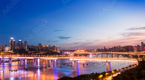 night view of the city, with two bridges and Yangtze River. in chongqing, china.