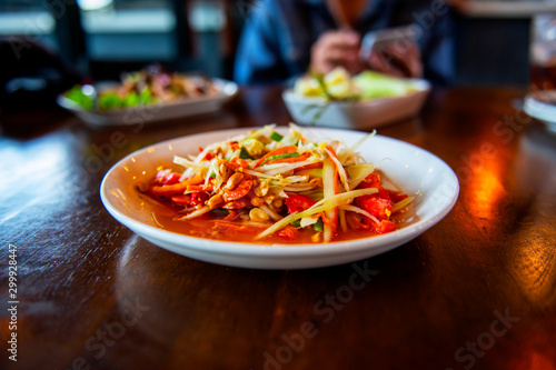 Papaya salad, delicious, sweet and sour, spicy seasoning cooking from papaya a popular country Thailand