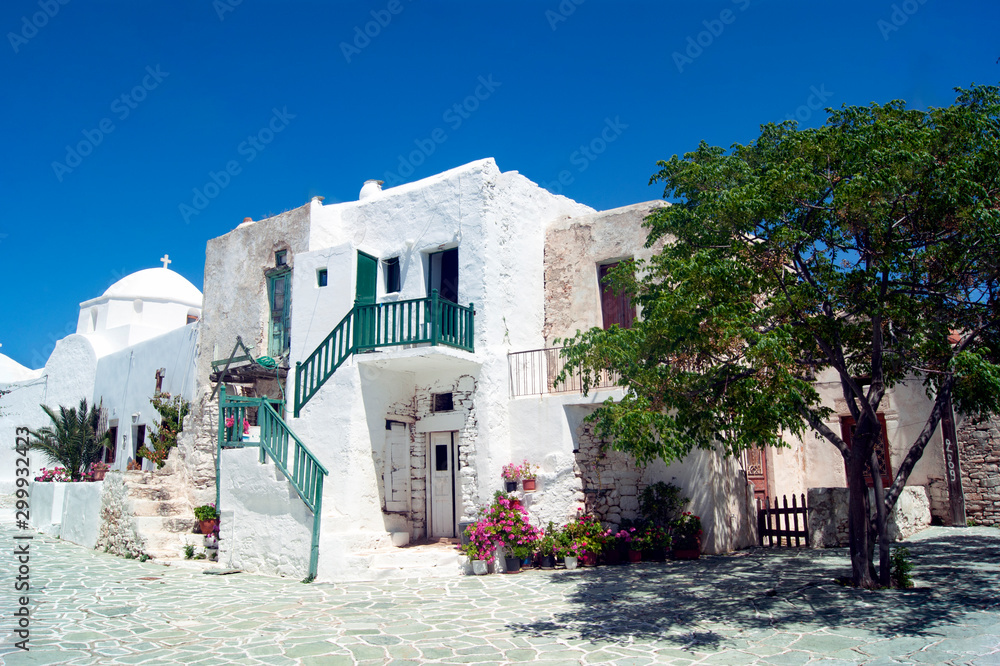 The historic old town of the Greek island of Folegandros. Traditional houses in the fortified part of the settlement, the Kastro.  Whitewashed buildings with external staircases.