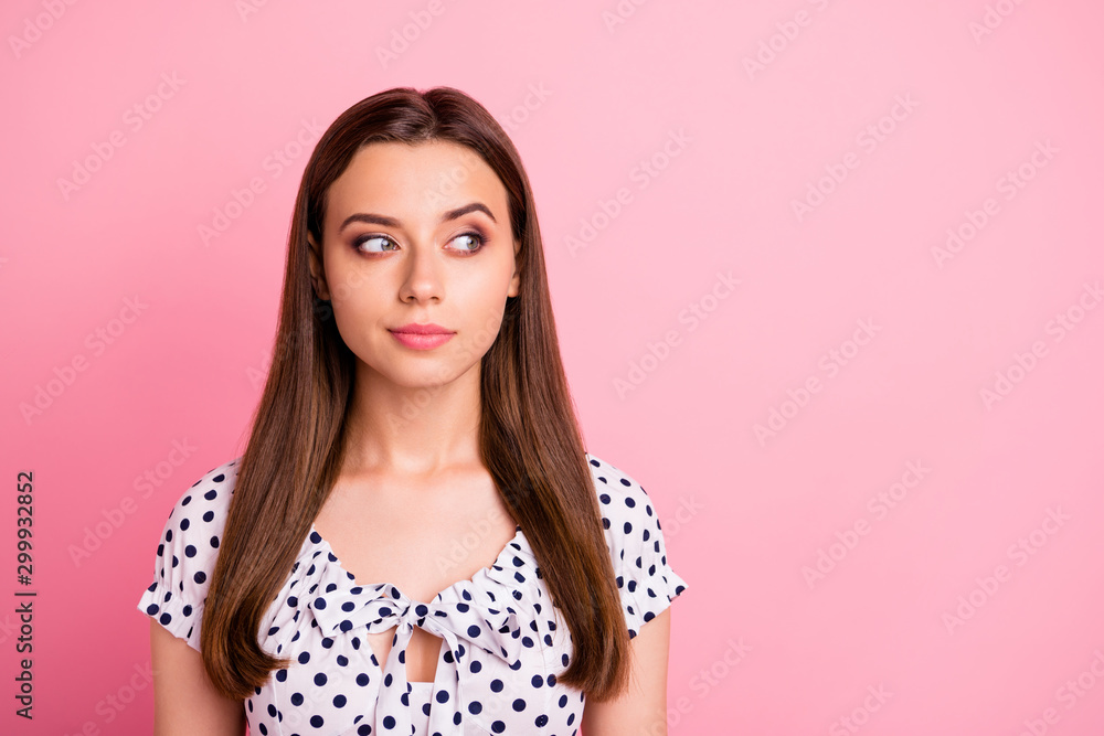 Photo of cute charming lovely girl thinking on something cunning while isolated with pink background Photo of cute charming lovely girl thinking on something cunning while isolated with pink background