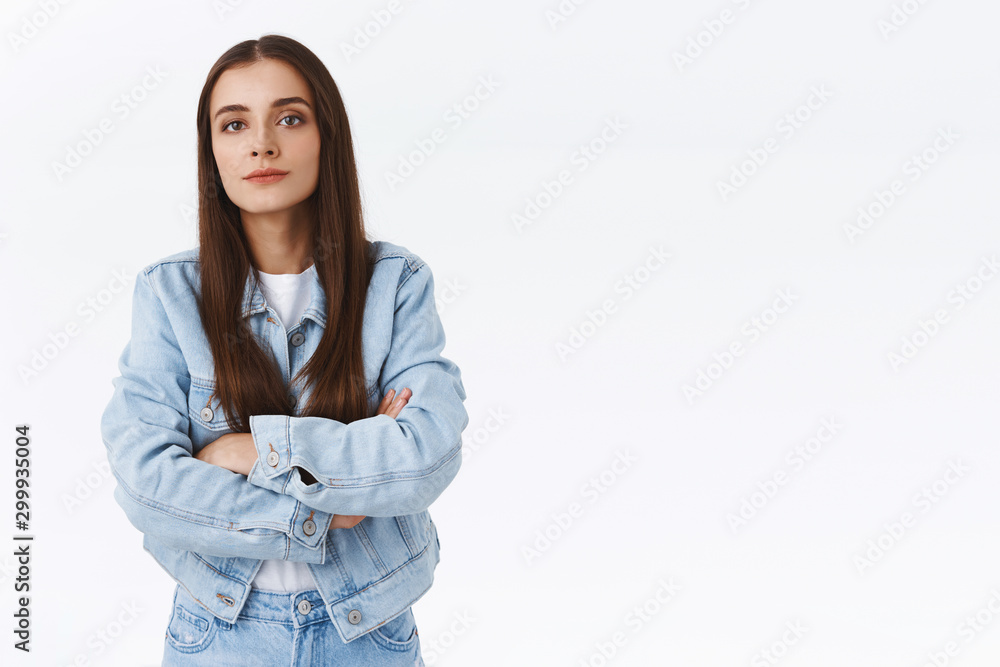 Offended serious-looking sulking brunette girl, cross hands over chest look arrogant and snobbish, standing insulted with upset, bothered expression, posing annoyed over white background Offended serious-looking sulking brunette girl, cross hands over chest look arrogant and snobbish, standing insulted with upset, bothered expression, posing annoyed over white background