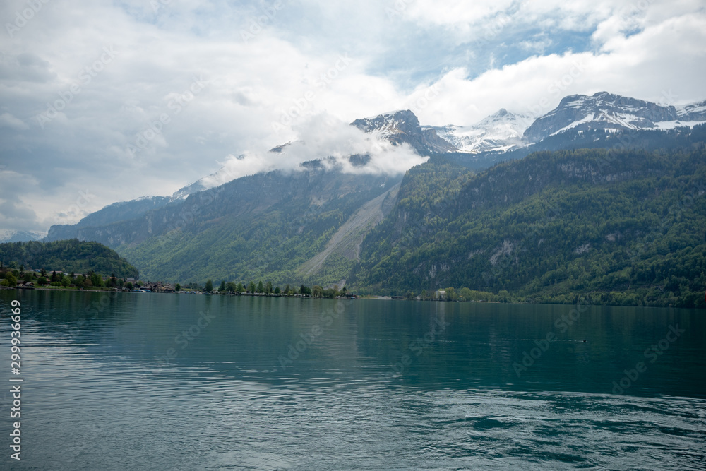 Beautiful scene of lake Brienz on cloudy sky and mountain background with copy space, Switzerland