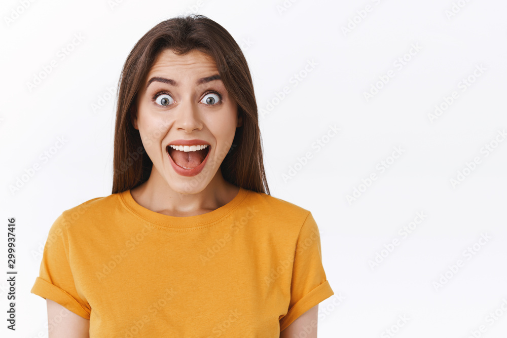 Thrilled, happy and joyful good-looking woman yelling from happiness and excitement, receive stunning awesome news, smiling surprised and glad, standing white background cheerful Thrilled, happy and joyful good-looking woman yelling from happiness and excitement, receive stunning awesome news, smiling surprised and glad, standing white background cheerful