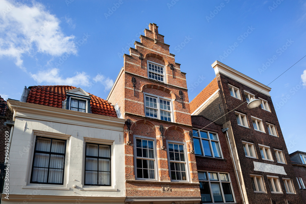 Fototapeta premium Old buildings with different gables in Dordrecht
