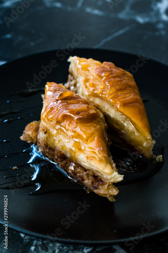 Homemade Turkish Dessert Organic Baklava with Honey photo