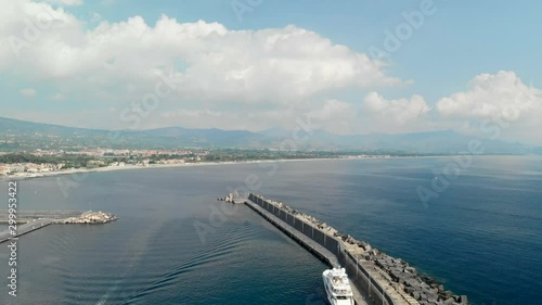 Aerial along Marina di RIposto harbour in Sicily Italy photo