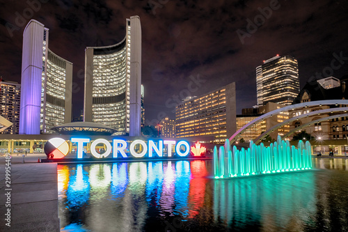 Nathan Phillips Square at night with Toronto Sign and City Hall Building