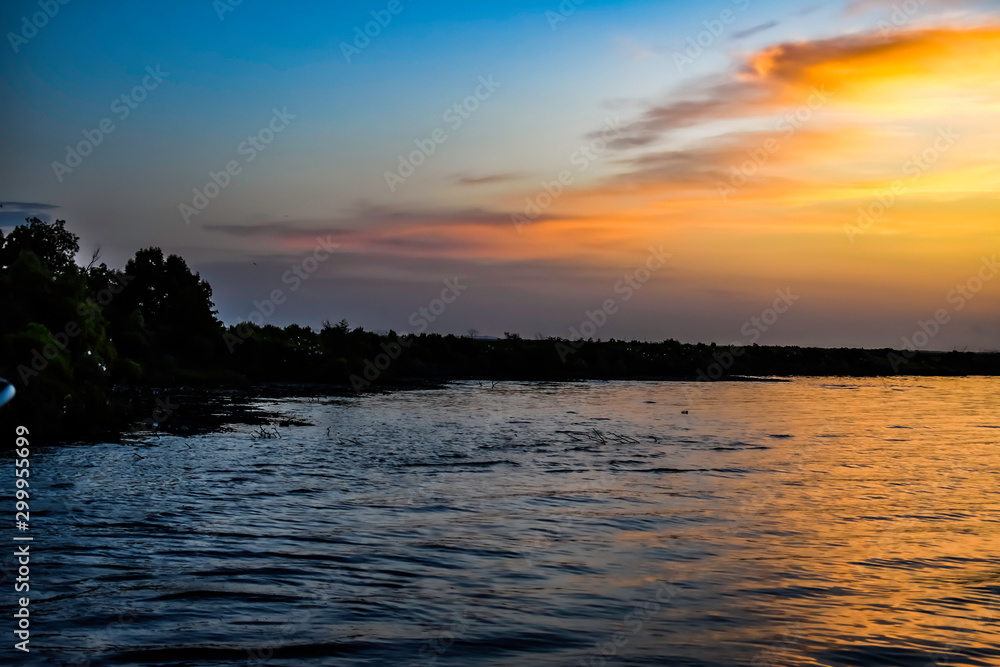 Fototapeta premium clouds over lake at dawn