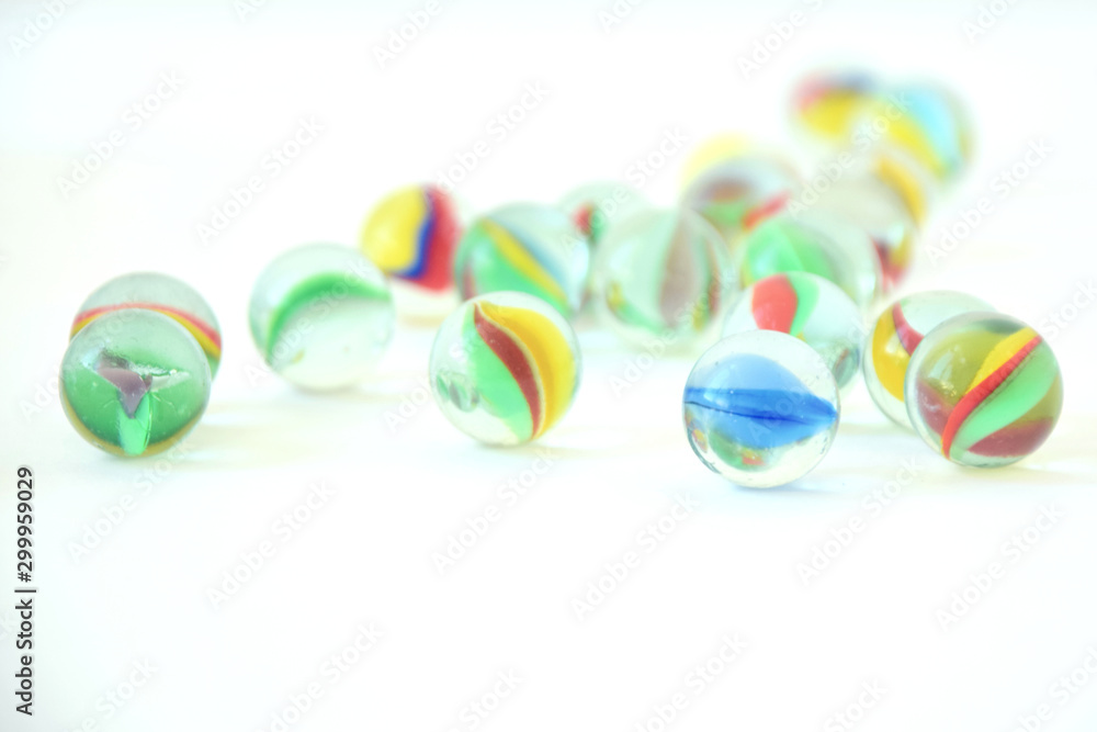 colorful glass balls in white background colorful glass balls in white background