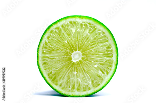 lime lemon green with cut half isolated on white background