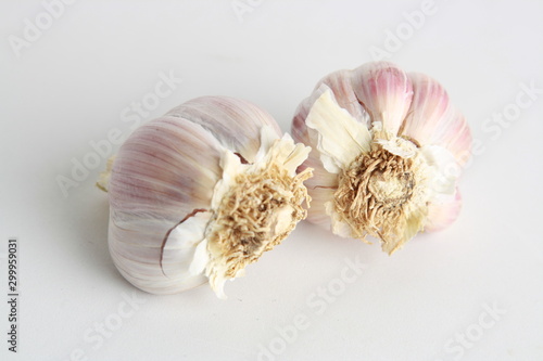 head of garlic on white background