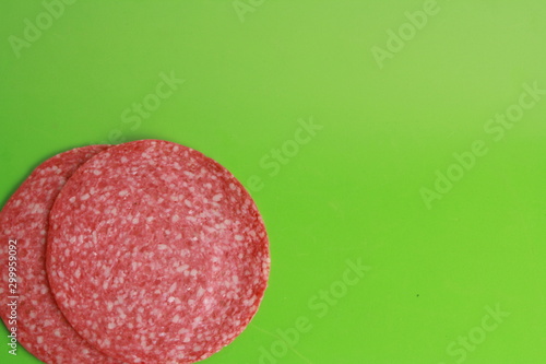 slices of salami in colorful background