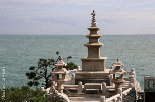 View of scenic stone pagodas in Haedong Yonggungsa temple overlooking Korea Strait, Busan, South Korea