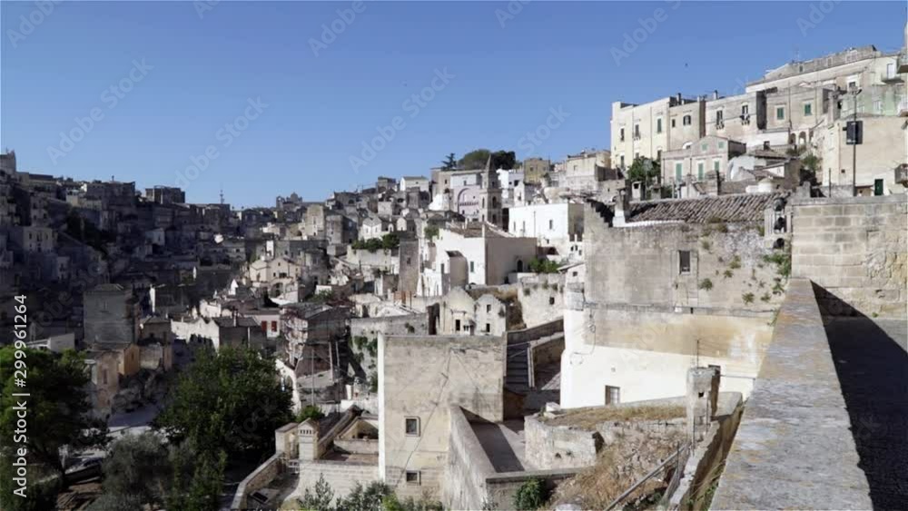 Panoramic view of the ancient Sassi district of Matera, Italy in a sunny August day Panoramic view of the ancient Sassi district of Matera, Italy in a sunny August day