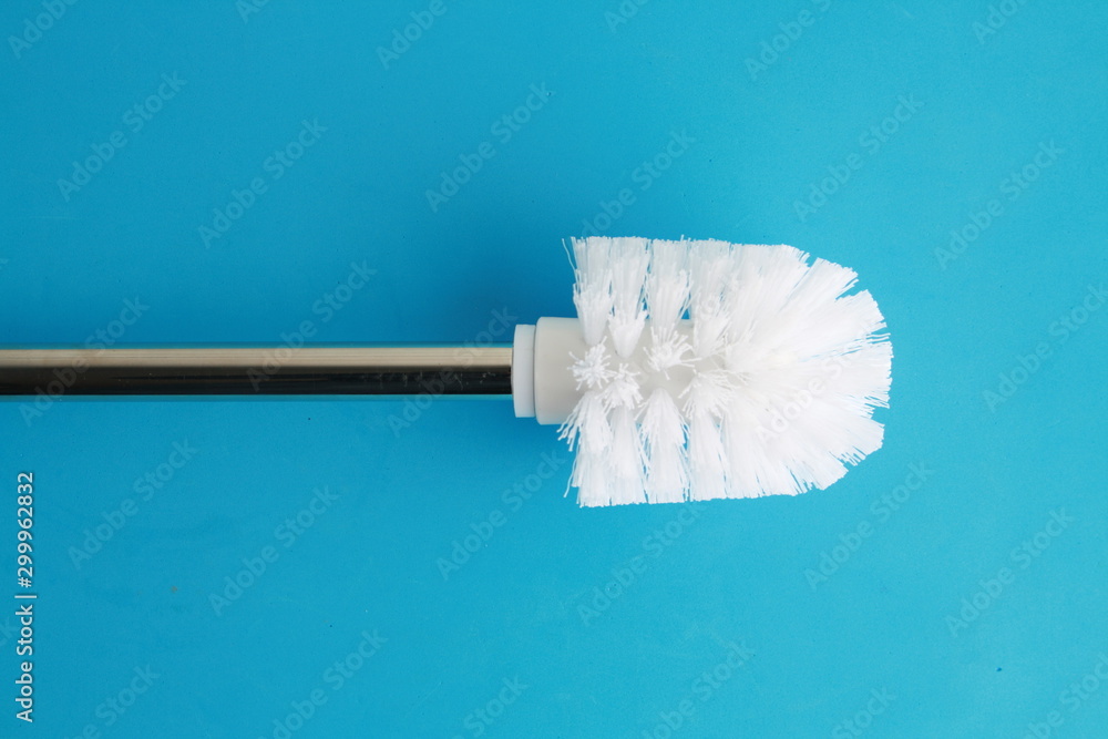 toilet brush in white and silver