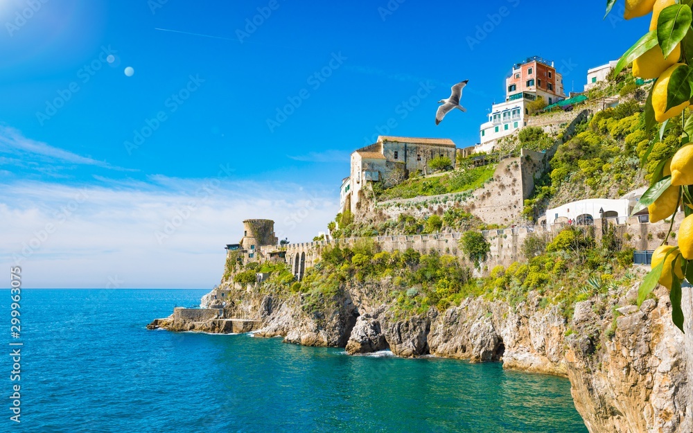 Rocky coast and clear blue sea next to beautiful Amalfi, Campania, Italy. Amalfi coast is most popular travel and holiday destination in Europe.