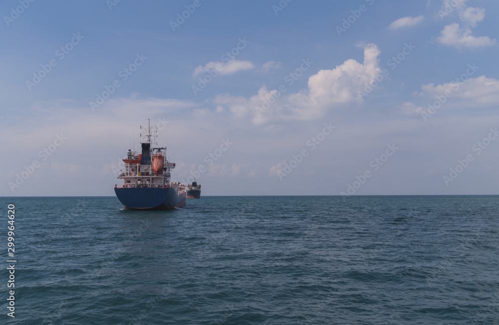 Logistics and transportation of International Container Cargo ship in the ocean at Sunshine sky, Freight Transportation, Shipping Logistics and transportation of International Container Cargo ship in the ocean at Sunshine sky, Freight Transportation, Shipping