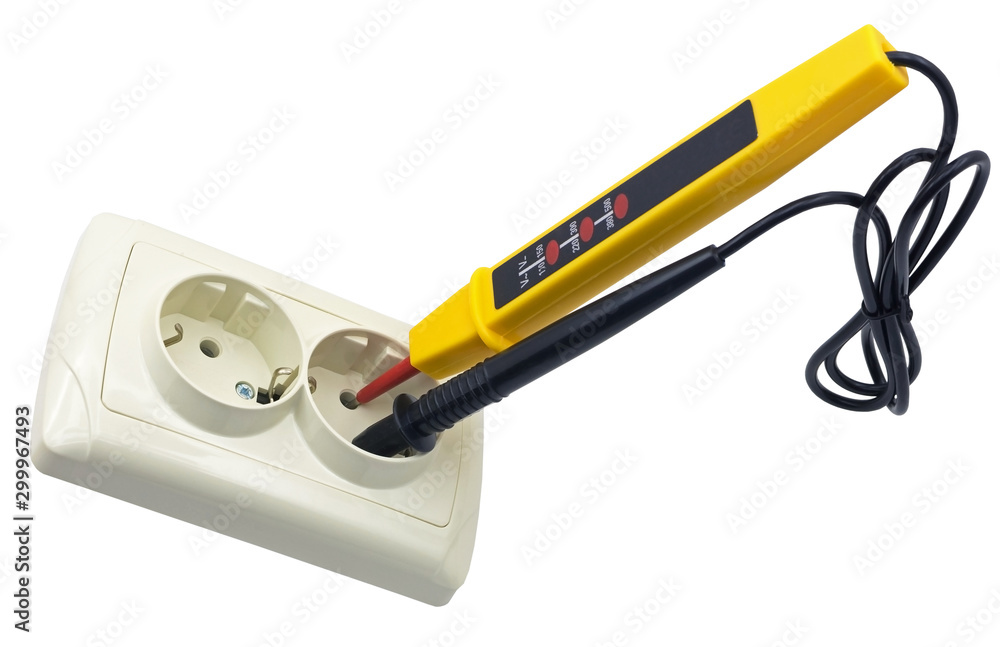 Electrician testing for electricity with a voltage tester