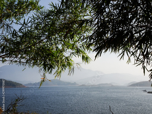 a reservoir with mountains in the background