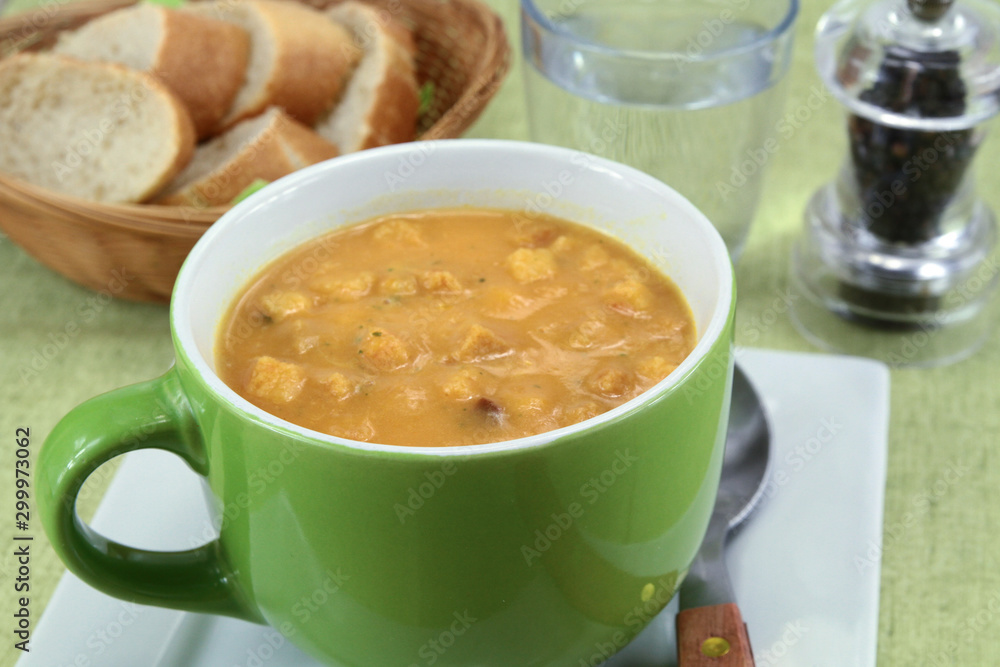 bowl of soup with vegetables and croutons bowl of soup with vegetables and croutons