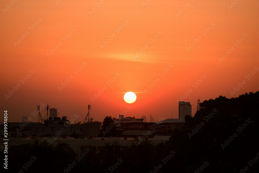 Sunset view Beautiful golden yellow sky in big cities	