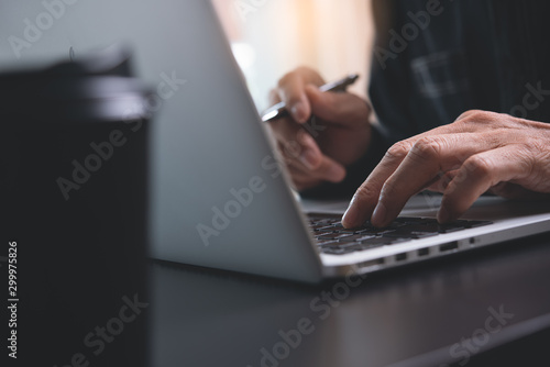 Man working on laptop photo