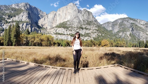 young woman in the mountains