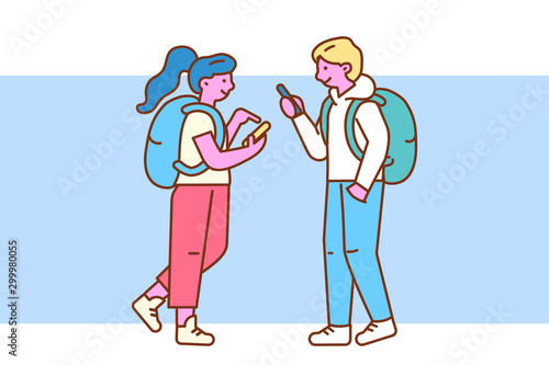 MYoung guy and girl use smartphones to communicate standinng opposite. Internet addiction. Flat design line style minimal vector illustration.