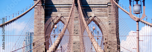 Panoramic Brooklin bridge view on the blue sky background photo