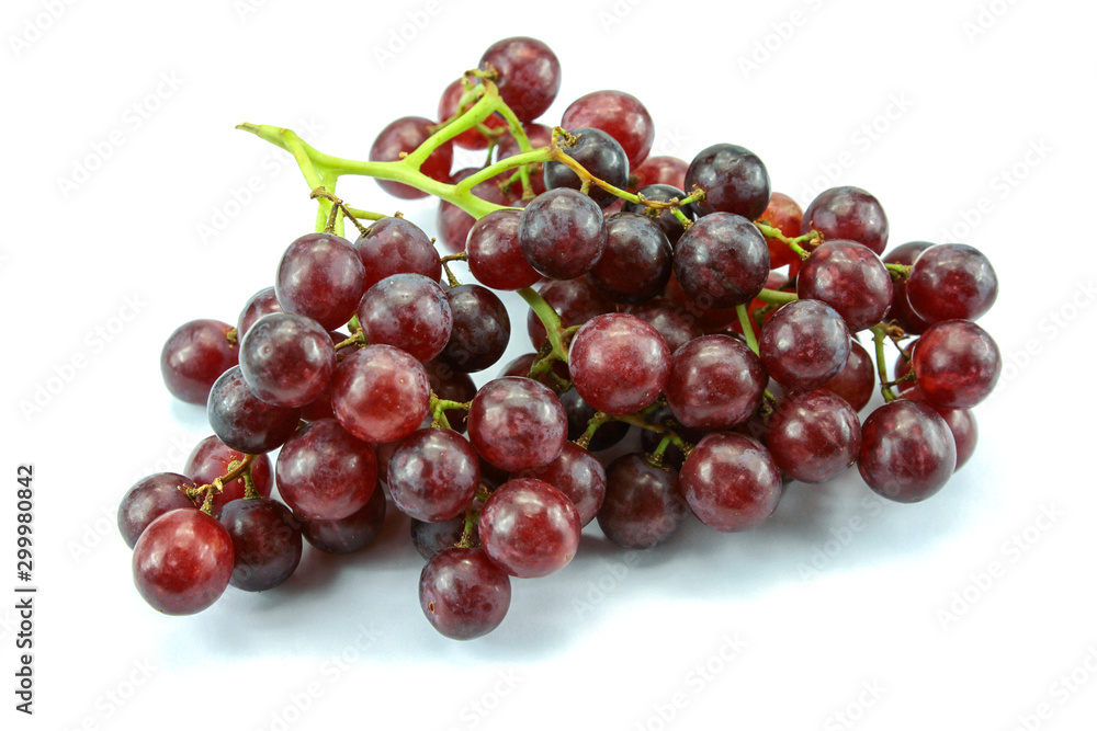 bunch of black grapes on a white background