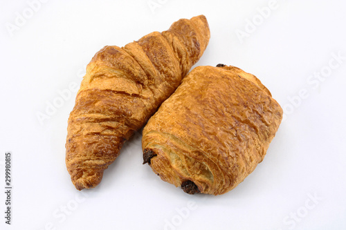 chocolate bread and croissant on a white background