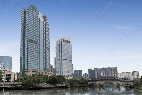 modern buildings and old bridge in chengdu, sichuan