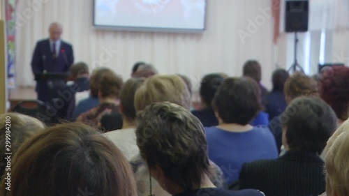 Wallpaper Mural People at the business development forum. View from the back of the auditorium with people at a conference or presentation. Torontodigital.ca