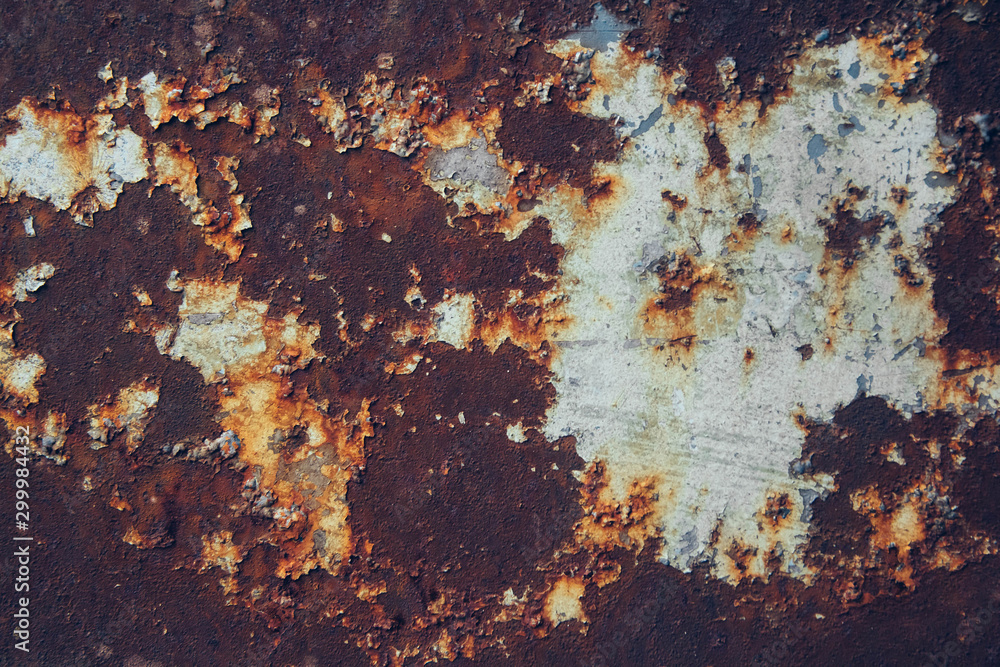 Rusty metal surface with blue paint residue as background image Rusty metal surface with blue paint residue as background image