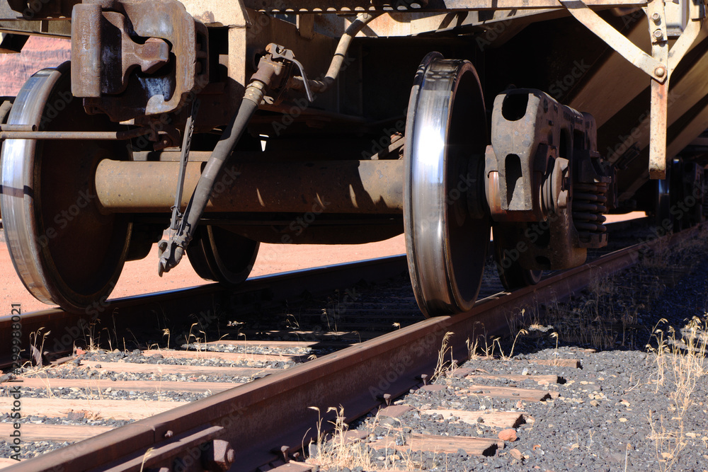 The wheels and one connecting end of a train car
