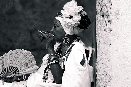 cuban santona smoking a cigar IV , havana - cuba © livcool