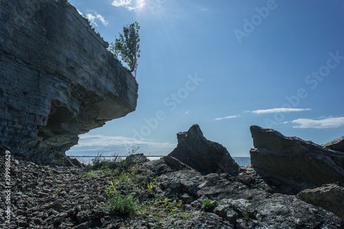 Stone wall on the Baltic sea in the summer. Pakri coast, island in Estonia, Europe.