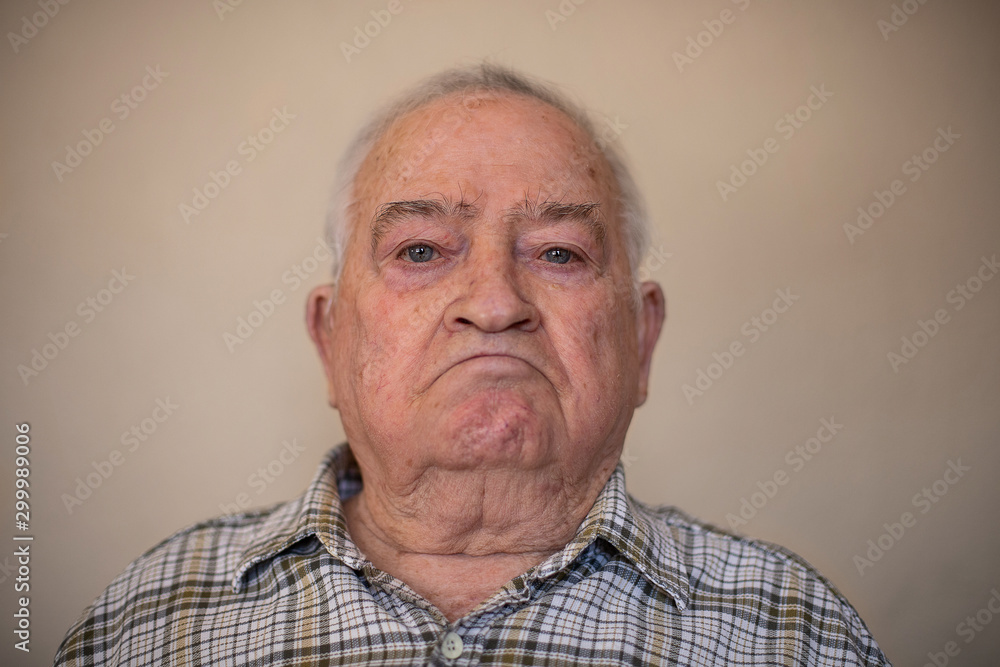 Portrait of an elderly man with sadness Portrait of an elderly man with sadness