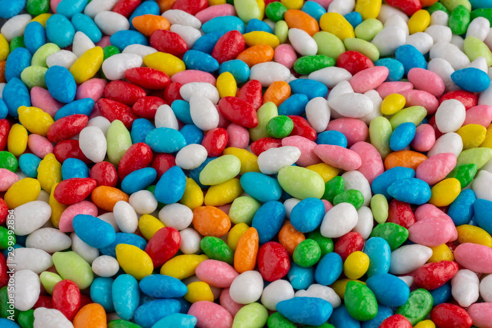 Vivid background of many candies in multi-colored glaze Vivid background of many candies in multi-colored glaze