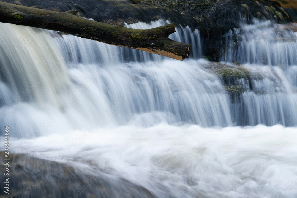 Jedlove Falls in super green forest surroundings, Czech Republic