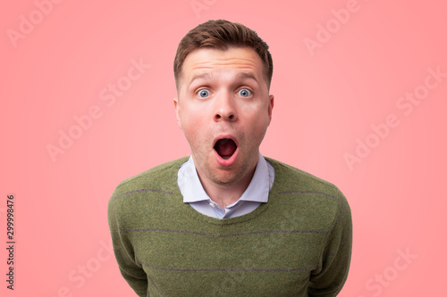 Young man with a shocked facial expression